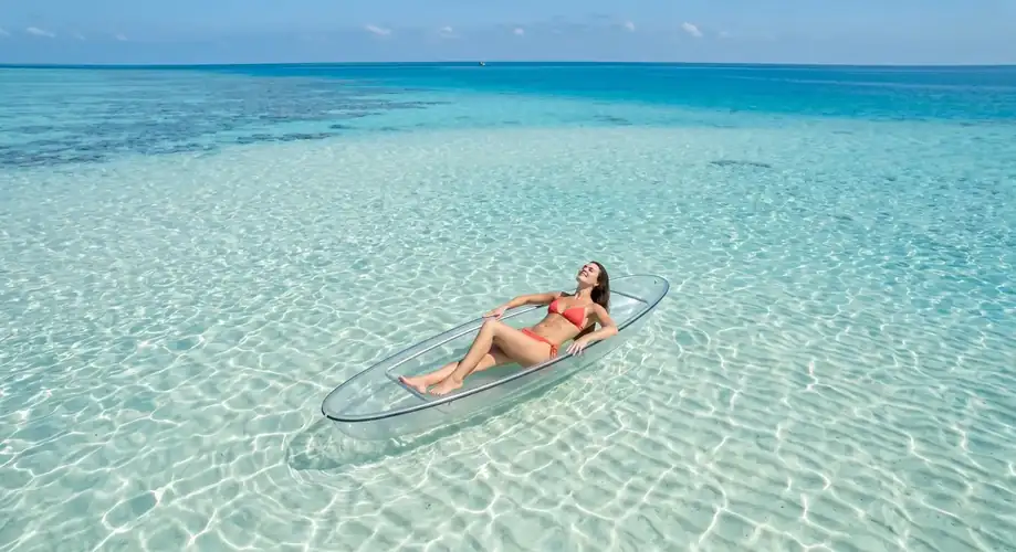 Sea kayaking on calm waters around Mataking Island near Doris Mataking Resort
